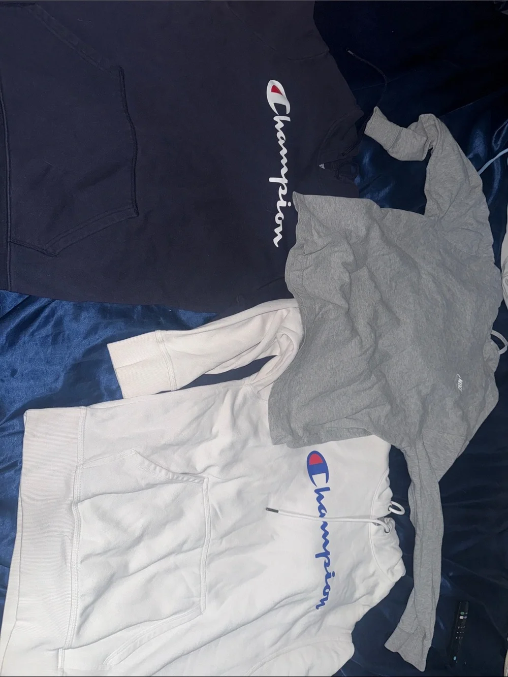 Champion Pullover Hoodies in Navy and White (M) Then gray Nike pullover (S)